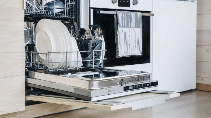 Open dishwasher in kitchen Grand Rapids MI appliance repair experts